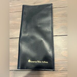 America West Airlines collectable, leather passport carrier. Black & gold